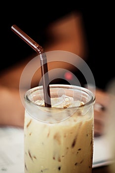 Cold Brew Coffee Easy homemade cold brew iced coffee relax man working in office blur background