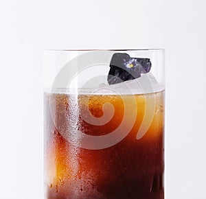 Cold Brew Coffee to Drink with Ice Cubes Decorated with Strawberry