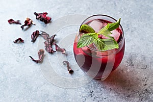 Cold Brew Hibiscus Tea with ice and Mint Leaves.