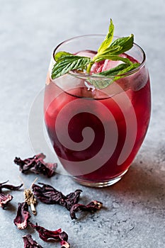 Cold Brew Hibiscus Tea with ice and Mint Leaves.