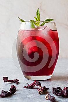 Cold Brew Hibiscus Tea with ice and Mint Leaves.