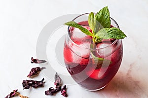 Cold Brew Hibiscus Tea with ice and Mint Leaves.