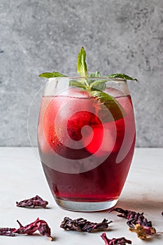 Cold Brew Hibiscus Tea with ice and Mint Leaves.