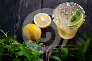 Cold brew iced tea with lemon and peppermint, summer refreshing