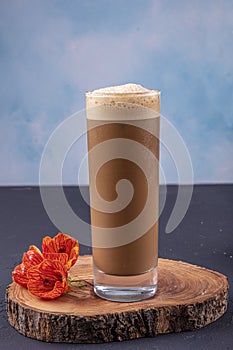 Cold brew or Nitro Coffee drink in the glass with bubble foam. Cold coffee