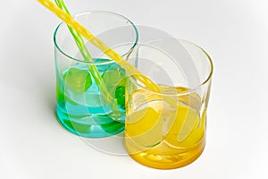 Cold, clean water in rainbow colored glasses