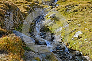 Cold clear water flows along the mountain