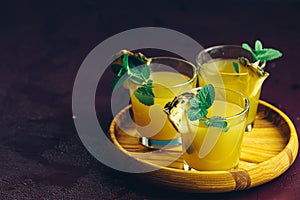 Cold cocktail with squeezed pineapple juice