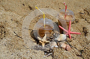 Cold coffee frappes on beach