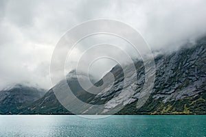 Cold colors Norway fjord panorama cloudy landscape