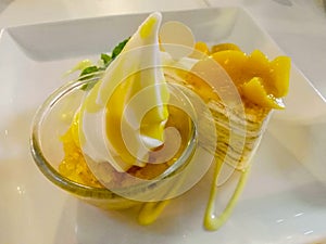 Cold dessert Fresh Peach with Soft Ice-cream