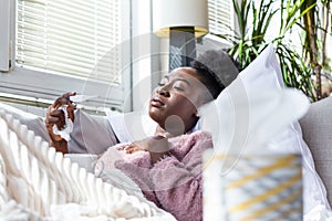 Cold And Flu. Portrait Of Ill black Woman Caught Cold, Feeling Sick havinh fever. Closeup Of Beautiful Unhealthy Girl Covered In