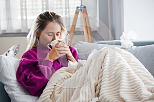 Cold And Flu. Portrait Of Ill Woman Caught Cold, Feeling Sick And Sneezing In Paper Wipe. Closeup Of Beautiful Unhealthy Girl