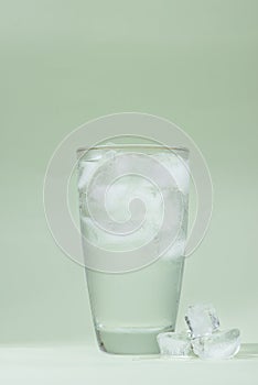 Cold fresh drinking water in glass on table