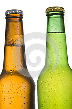 2 Cold Frosted Beer Bottles on White Background photo