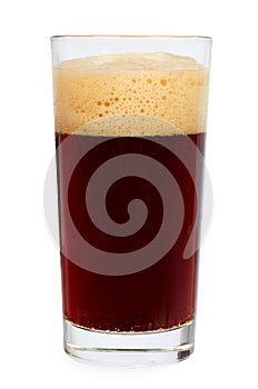 Cold glass of dark beer or kvass with foam isolated on white background.