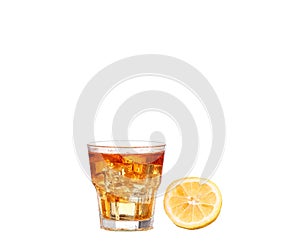 Cold glass of iced tea with ice cubes, isolated on white background with clipping path