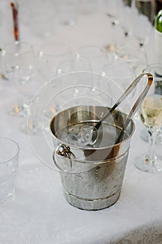 Cold ice in a bucket. Ice Bucket with tranparent cubes of ice