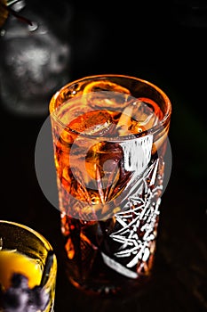 Cold iced tea with on black background