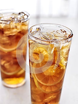 Cold iced tea with lemons. photo