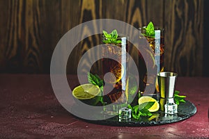 Cold Longdrink Cuba Libre with brown rum and fresh lime