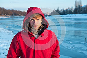 It is so cold. love winter nature. man in red parka. winter male fashion. warm clothes for frost. chill weather forecast