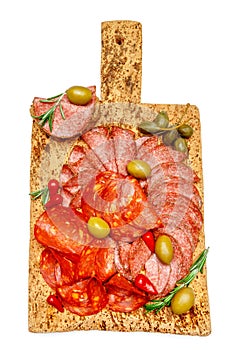 Cold meat plate with salami and chorizo sausage on cork wood board