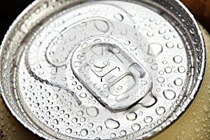 Cold metal beer can with water drops. Alcoholic drink