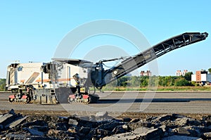 Cold milling machines are used for the quick, highly efficient removal of asphalt and concrete pavements. photo