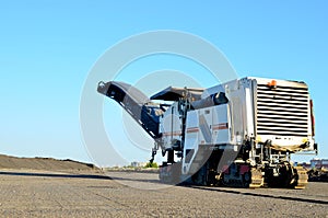 Cold milling machines are used for the quick, highly efficient removal of asphalt and concrete pavements. photo