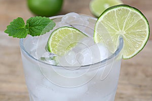 Cold mineral water drink with lime