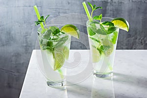 Cold Mojito Cocktails with Mint and Lime on Bar