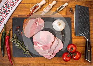 Cold platter of ham on wooden table