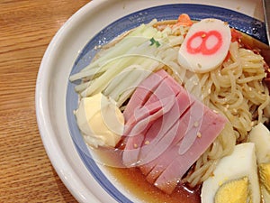 Cold remen with ham and egg in lemon sauce photo