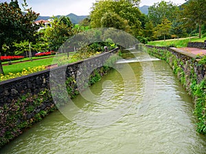 Cold River Ribeira Amarela in Alameda Tropical Garden in furnas town on the island of Sao Miguel in the Azores photo