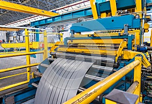 Cold rolled steel coil on decoiler of machine in metalwork manufacturing