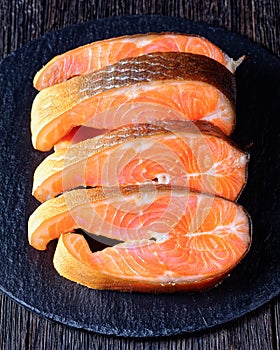 Cold-smoked arctic char on a wooden background