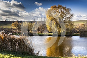 Cold spring day near a beautiful fishing lake in Sarisap, Hungary.