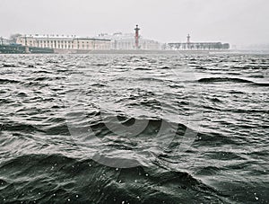 Cold spring in St. Petersburg. Neva river. Wave on the water surface