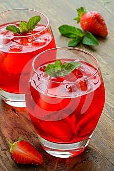 Cold strawberries drinks with strawberry slices