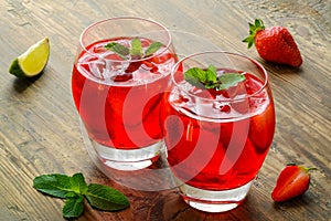 Cold strawberries drinks with strawberry slices