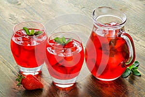 Cold strawberries drinks with strawberry slices