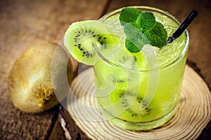 Cold summer drinks  Kiwi Lime  Mojito or caipirinha drink recipes  alcoholic cocktail  lemon or mint and fresh kiwis