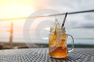 Cold summer honey cocktail with ice;