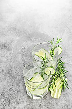 Cold summer lemonade Fresh drink cucumber ice rosemary herb