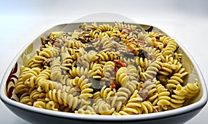 Cold summer salad, fusilli italian pasta, pasta fredda, in white bowl