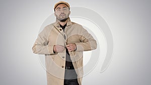 Cold weather Autumn or winter day Man in trench buttons up on gradient background.