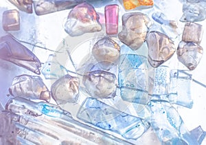 Cold winter freezing shining cute light pastel colors blue pink crystal clean glass marbles gems stones background