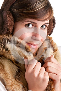 Cold Woman Snuggling in Warm Coat