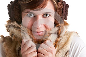 Cold Woman Snuggling in Warm Coat